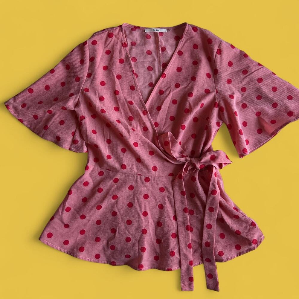 Pink polka dot tie front peplum